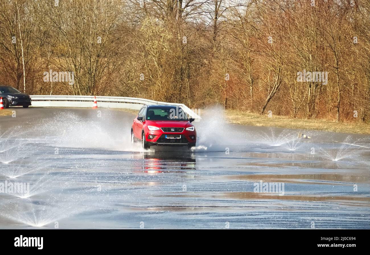 ADAC driving safety training aquaplaning on a practice area Stock Photo