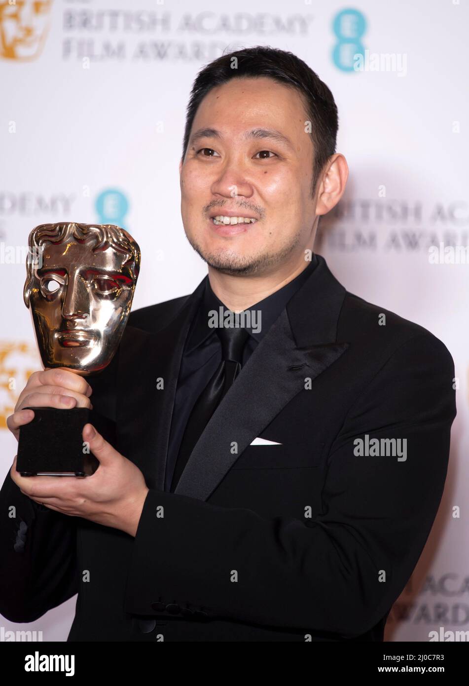 March 13th, 2022, London, UK. Ryusuke Hamaguchi in the Winners Room at the EE British Academy Film Awards, the Royal Albert Hall, London. Credit: Doug Stock Photo