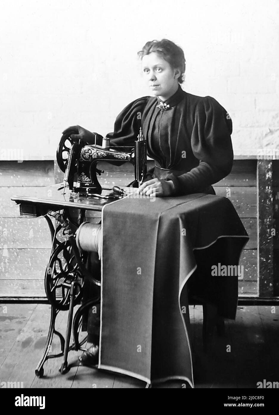Piece numbering in a woollen mill in Bradford, Yorkshire, late Victorian period Stock Photo