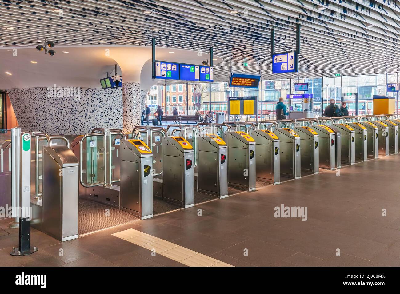 DELFT, THE NETHERLANDS - MARCH 3, 2016: The newly built train station with access gates in Delft, The Netherlands Stock Photo