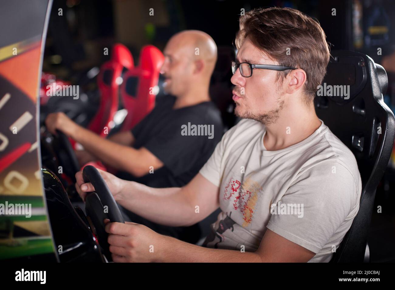 Driving simulation game computer steering wheel hi-res stock ...