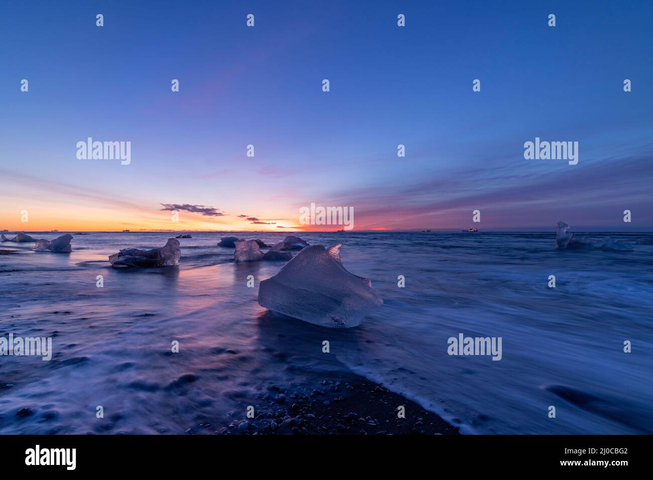 sunrise and icebergs at Diamond Beach, Breidamerkursandur, southeast