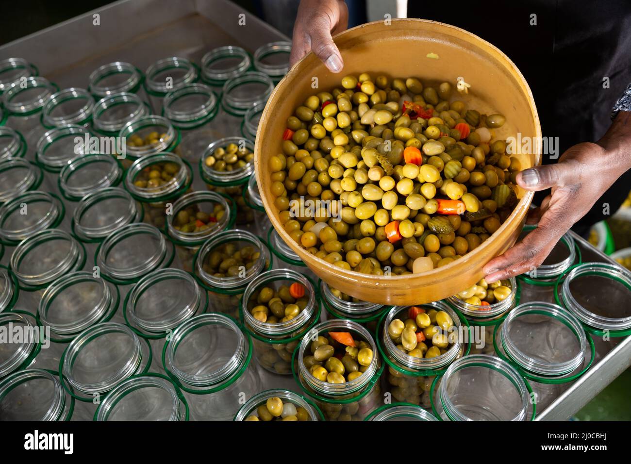 Preparing for pickling olives at food factory Stock Photo Alamy