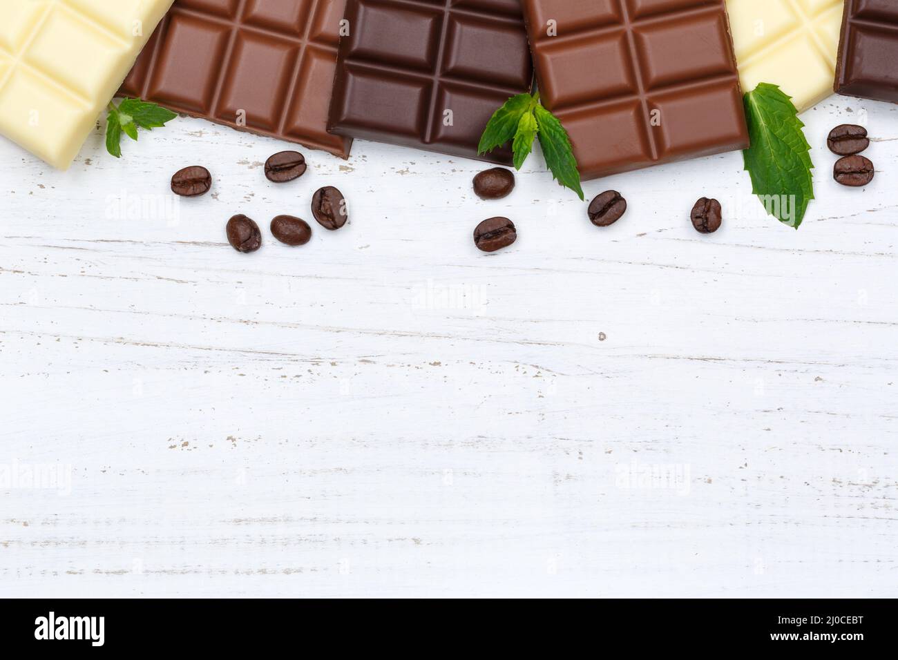 Chocolate bar candy food text free space wood from above Stock Photo