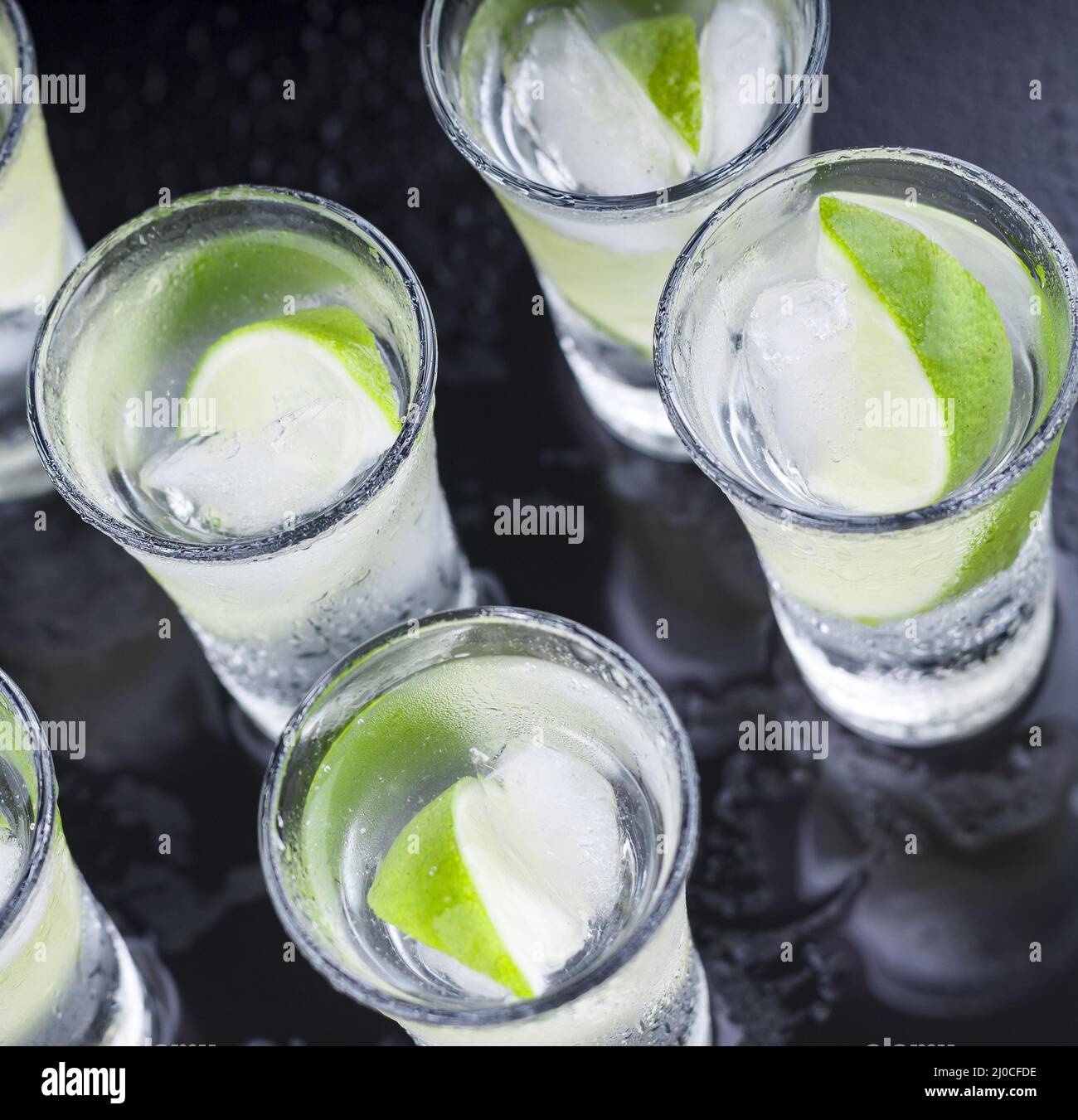 Cocktail. Vodka, gin, tequila with lime Stock Photo Alamy