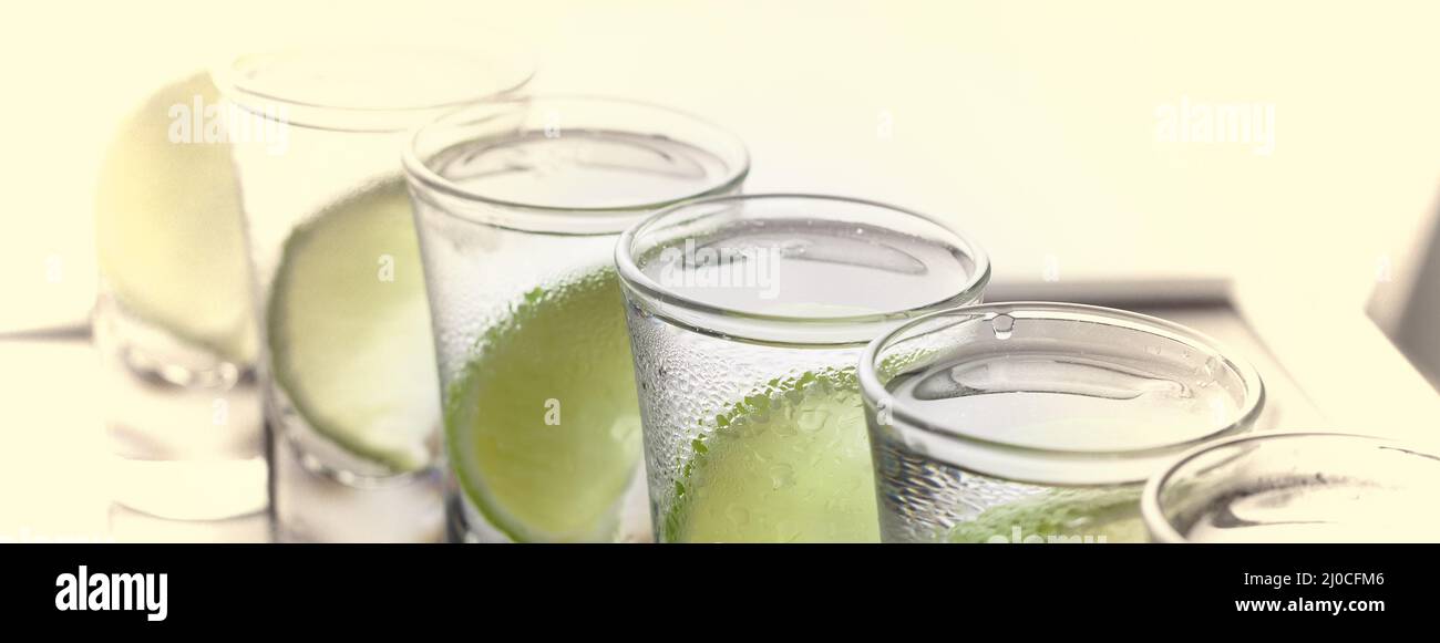 Vodka, gin, tequila with lime. Cocktail Stock Photo Alamy