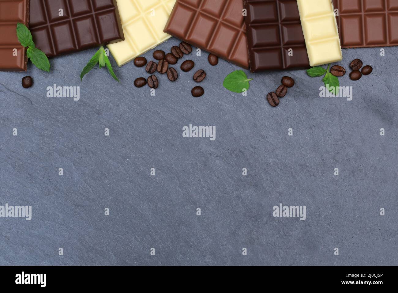 Chocolate blackboard slate food text free space from above Stock Photo