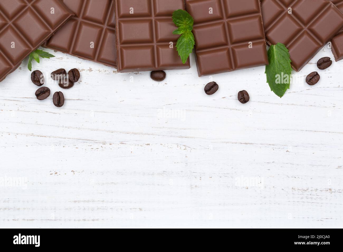 Chocolate milk chocolate bar food text free space from above Stock Photo