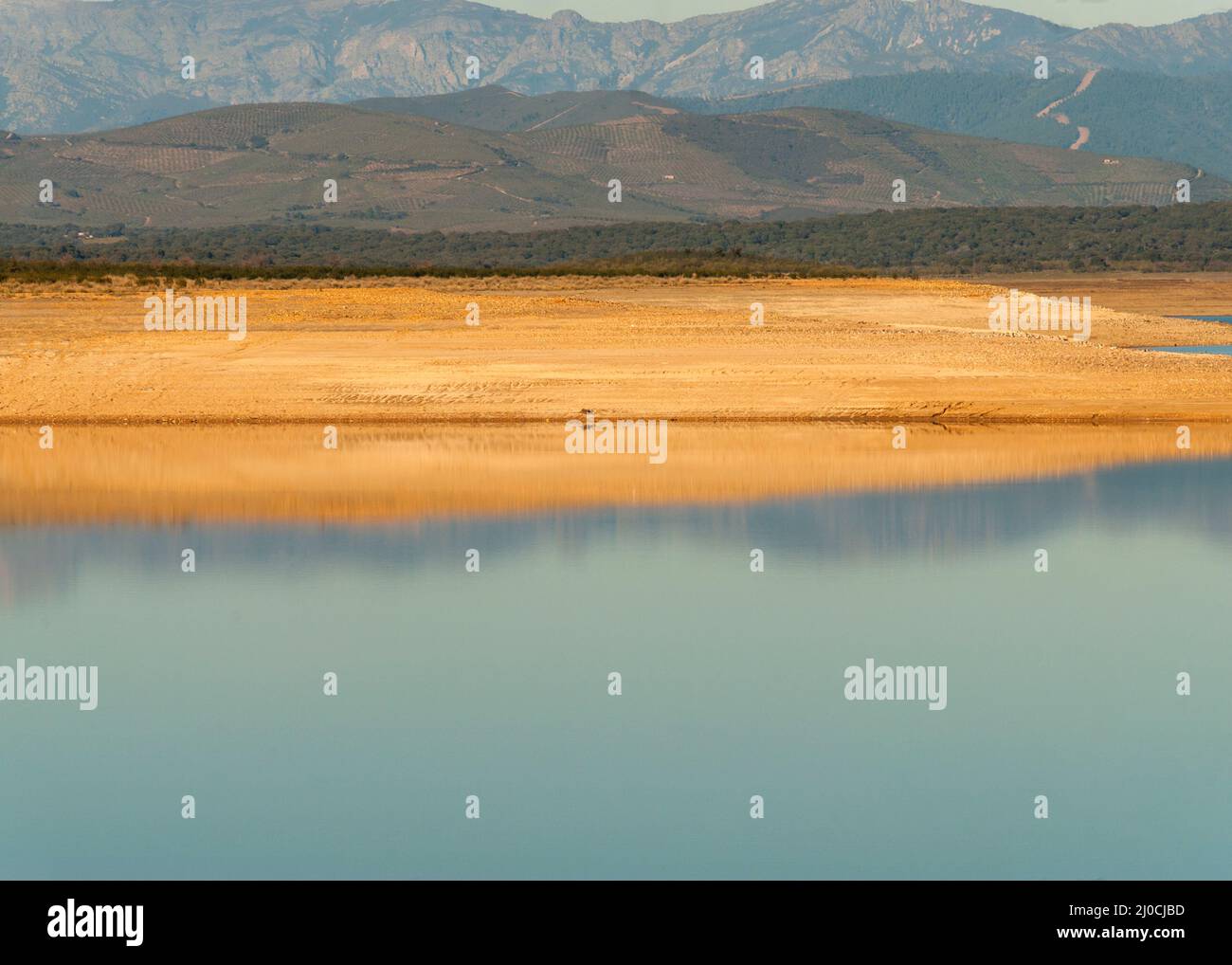 Low reservoir level as a result of drought and lack of rain in Embalse Gabriel y Galan, Extremadura, Spain Stock Photo