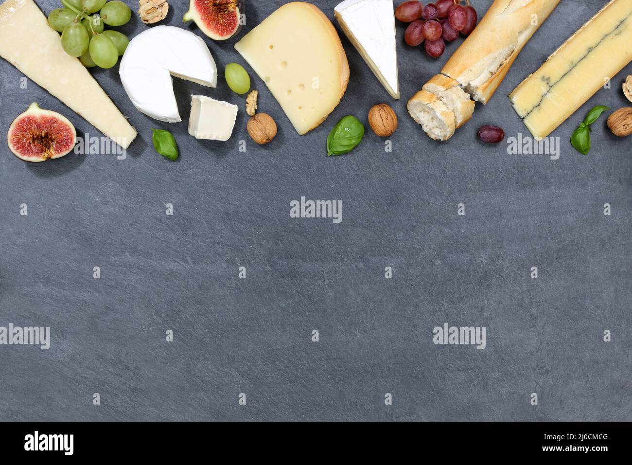 Cheese plate swiss cheese plate bread camembert text free space slate