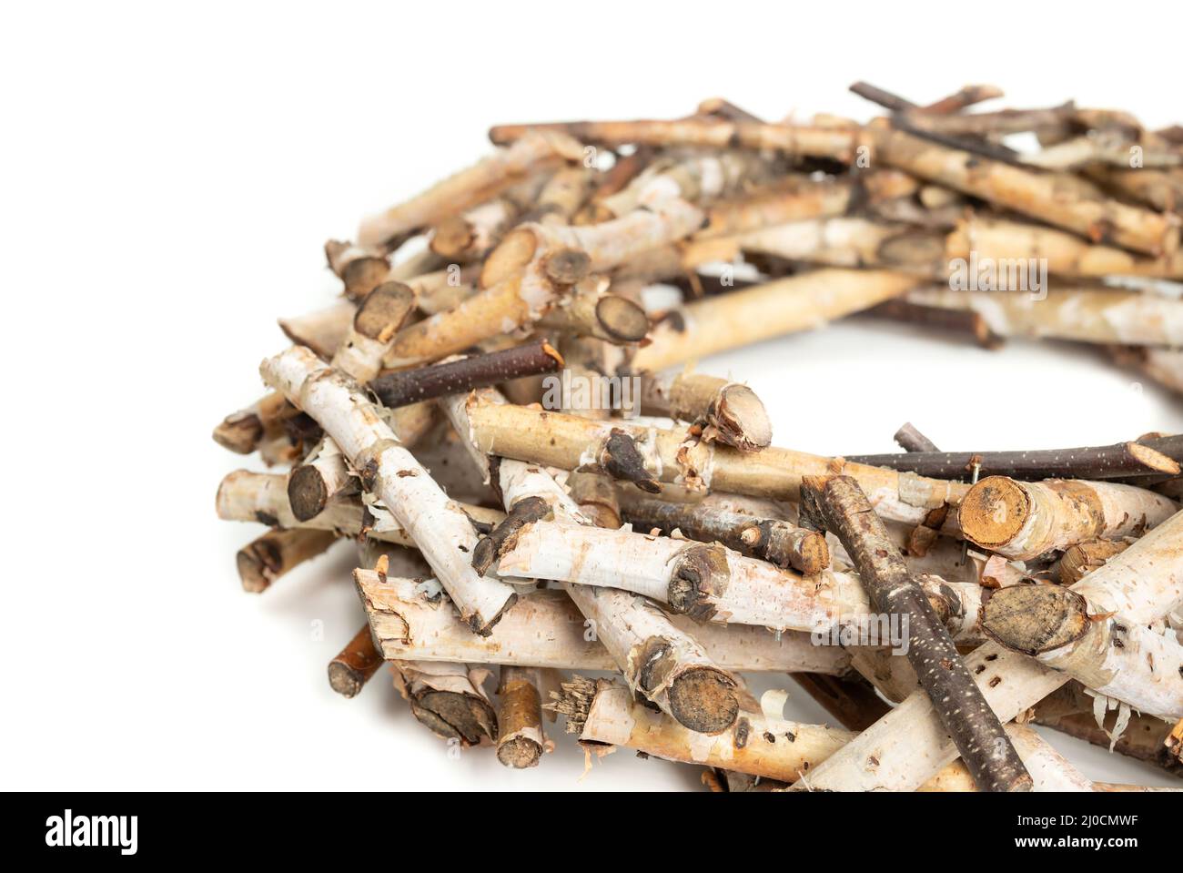Real birch twig wreath. Birch tree branches arranged in a large circular nest shape. Natural wood decoration used for table center pieces or seasonal Stock Photo