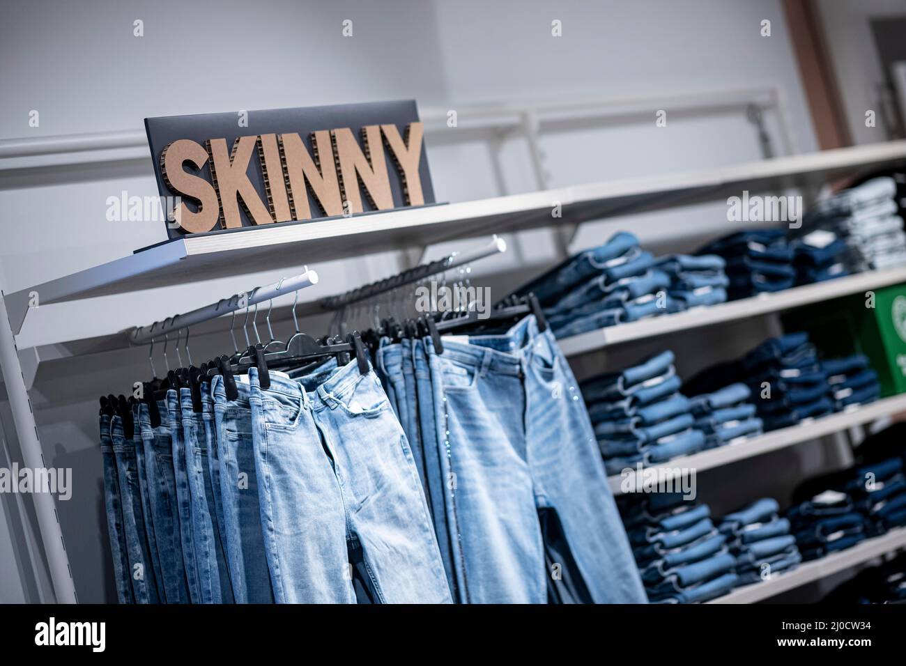 Berlin, Germany. 02nd Mar, 2022. Various jeans of the Slim category are in  the men's department in the C&A clothing store in a shopping center in  Berlin-Marzahn. Credit: Fabian Sommer/dpa/Alamy Live News