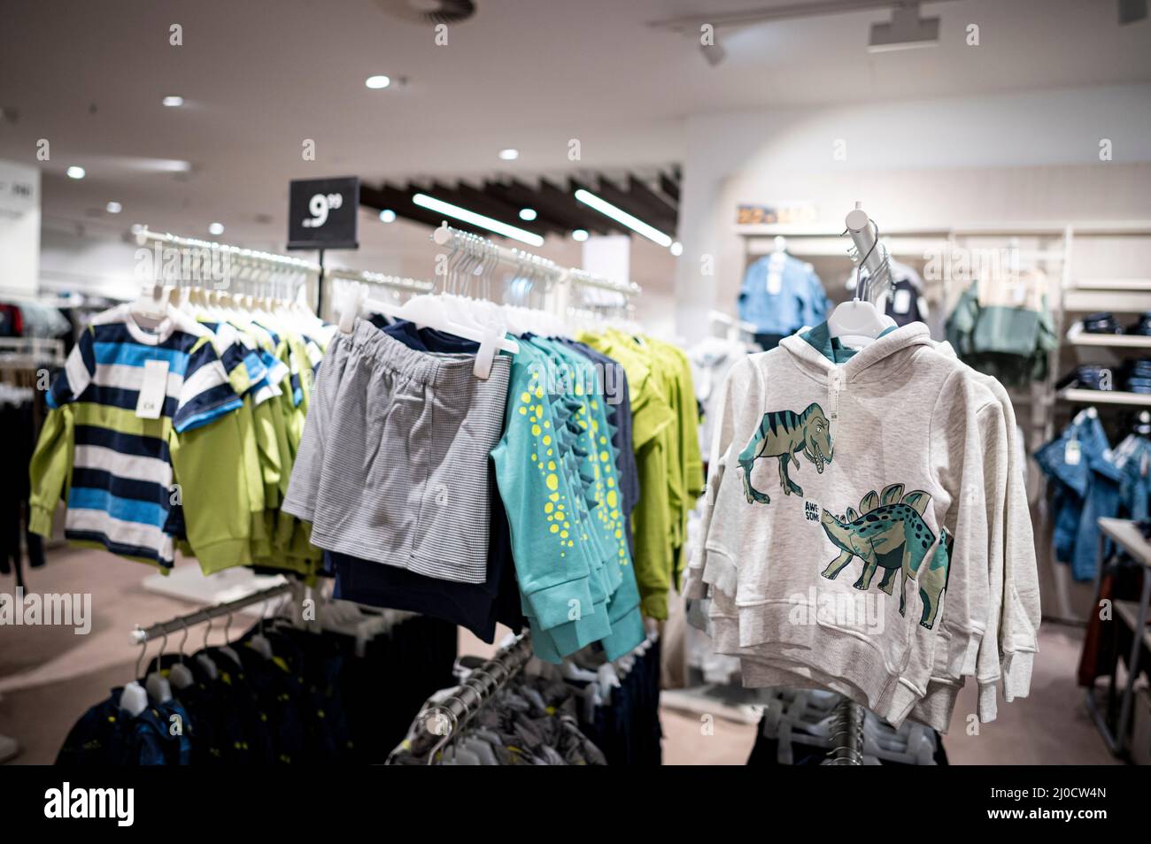 ILLUSTRATION - 02 March 2022, Berlin: Various tops for boys hang in the  children's department at the C&A clothing store in a shopping center in  Berlin-Marzahn. Photo: Fabian Sommer/dpa Stock Photo - Alamy