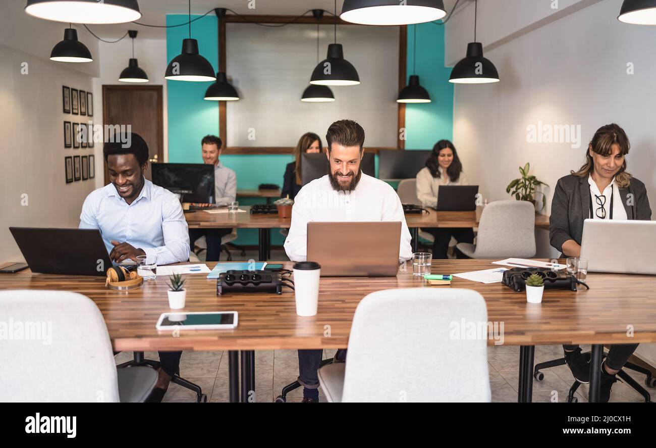 Business team in co-working creative space Stock Photo