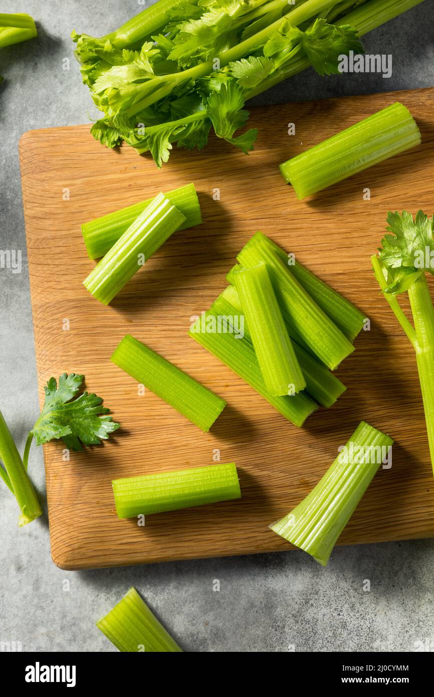 Raw Green Organic Celery Stalks in a Bunch Stock Photo Alamy