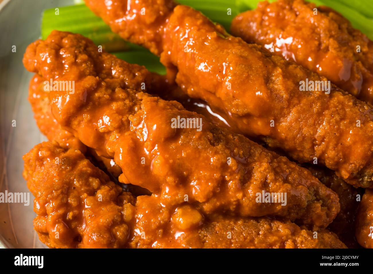 Homemade Buffalo Chicken Tenders with Celery and Blue Cheese Stock
