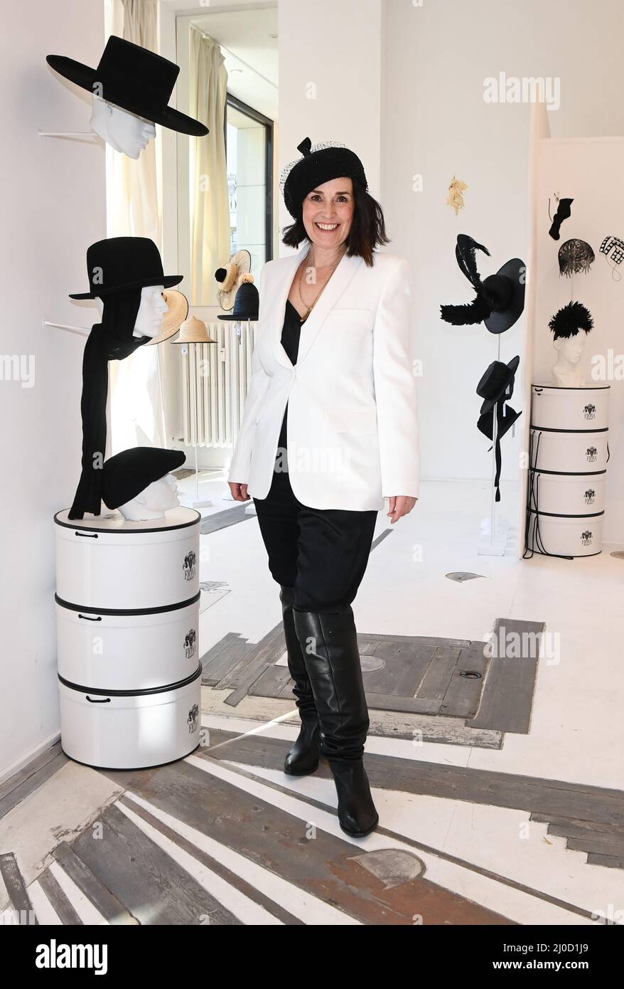 Berlin, Germany. 18th Mar, 2022. The milliner Fiona Bennett celebrates her anniversary '10 years Hutpalast' in her salon in Potsdamer Straße. She also presents the summer collection 'kiss me quick 22' during the Berlin Fashion Week. Credit: Jens Kalaene/dpa-Zentralbild/ZB/dpa/Alamy Live News Stock Photo