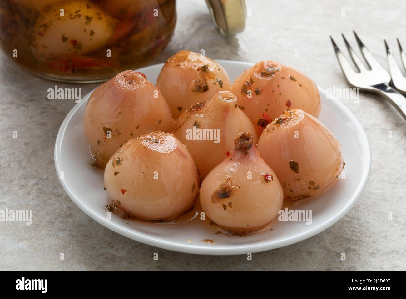 Preserved Lampascioni, Tassel grape, on a plate  close up as snack Stock Photo