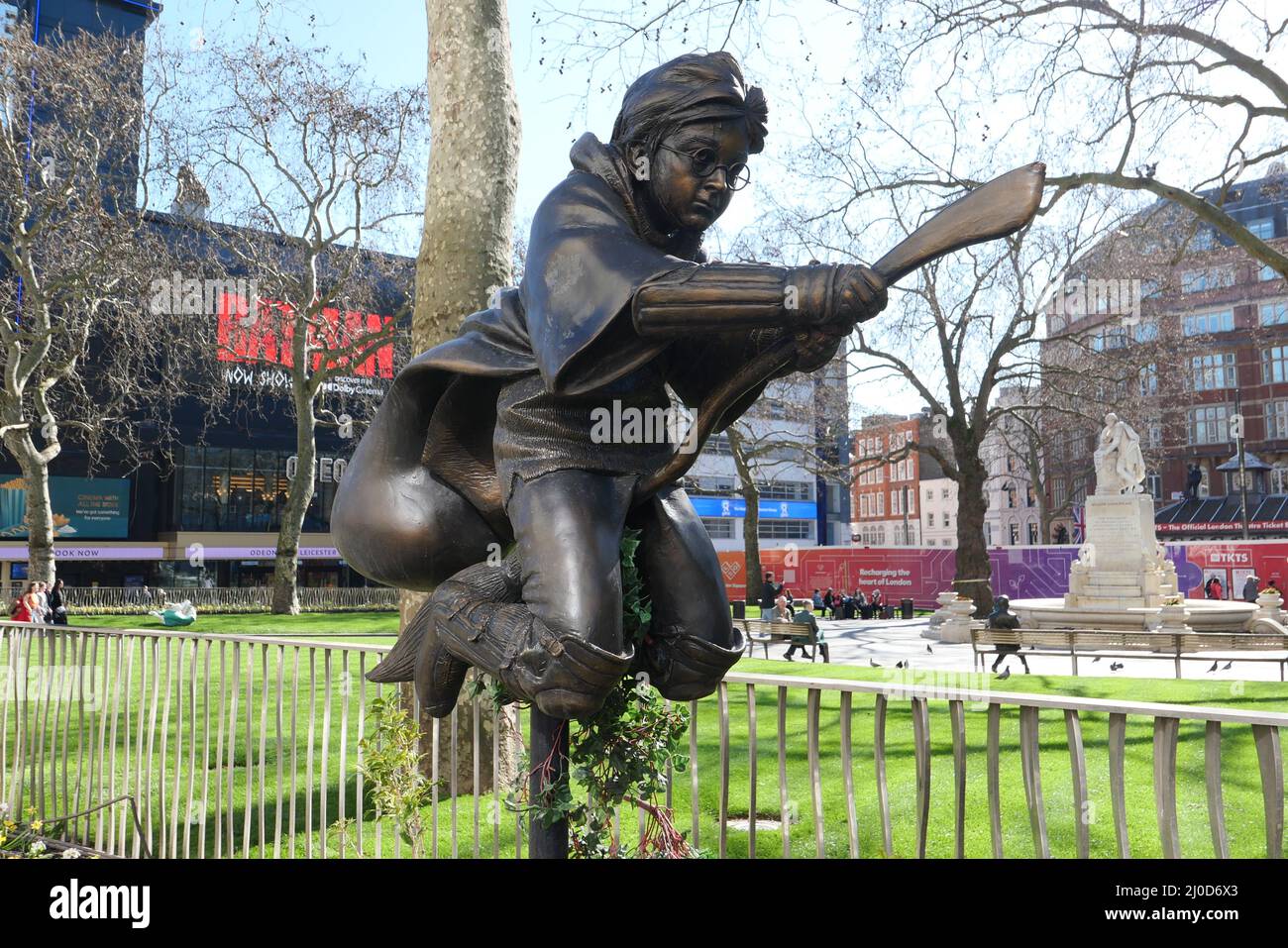 Harry Potter statue was a natural inclusion , it stands for one of the biggest film franchises to emerge from these shores it also happens to be located a stone 's throw away from the site of the UK premiere of Harry Potter and the Philosopher's Stone . As with the remainder of the statues , this one evokes a specific moment from film , namely the first time Harry Potter takes his Nimbus 2000 for a spin around the Hogwarts Quidditch pitch ..... Stock Photo