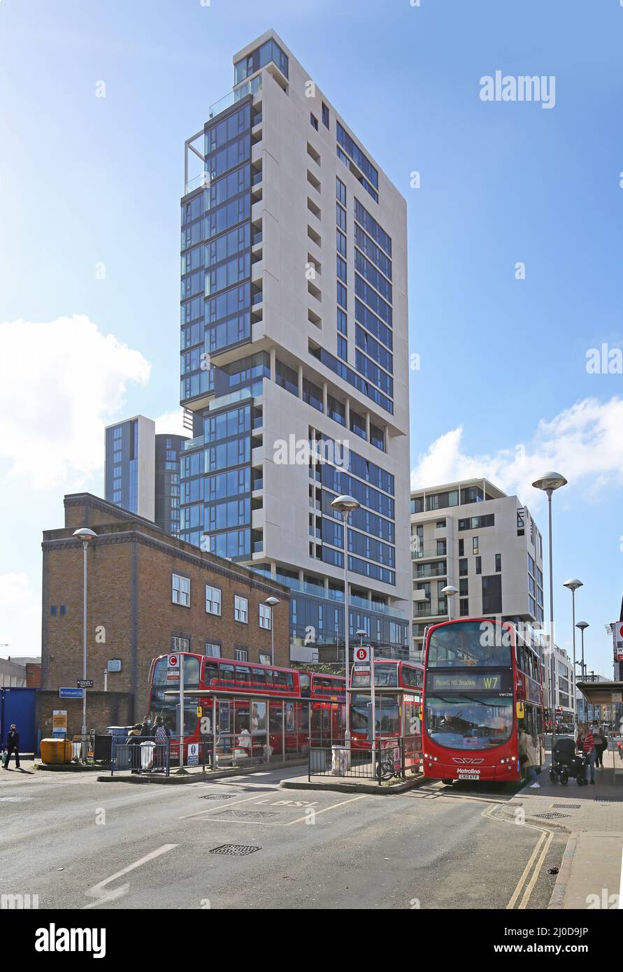 Finsbury Park, London, UK. Wells Terrace bus interchange with towers of the new City North residential development in the background. Stock Photo
