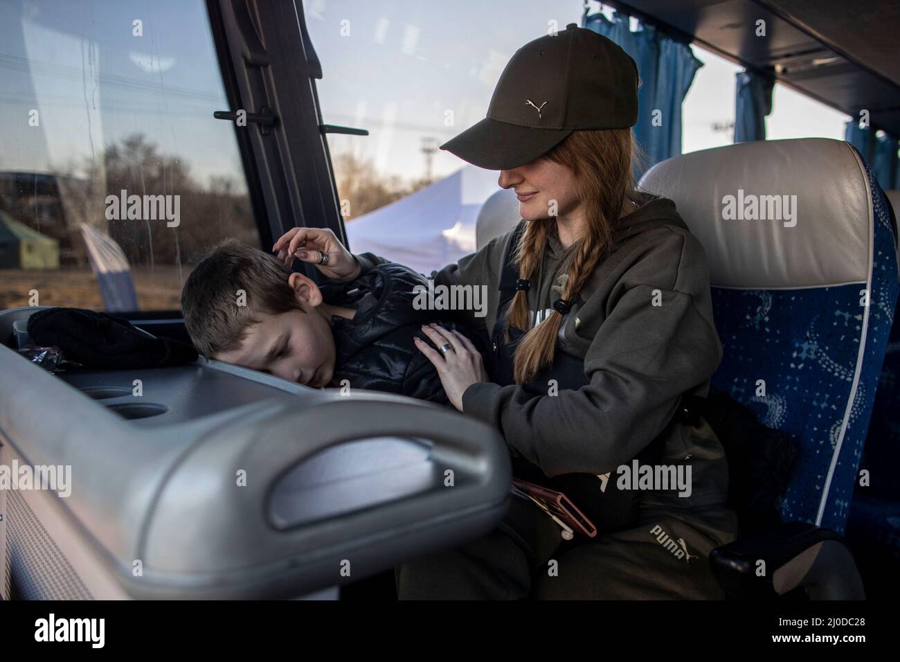 Vysne Nemecke, Slovakia. 18th Mar, 2022. In Vysne Nemecke, on Slovakia's  border with Ukraine, Ira and her son Sascha (11) are on a bus that is  supposed to take them to accommodation