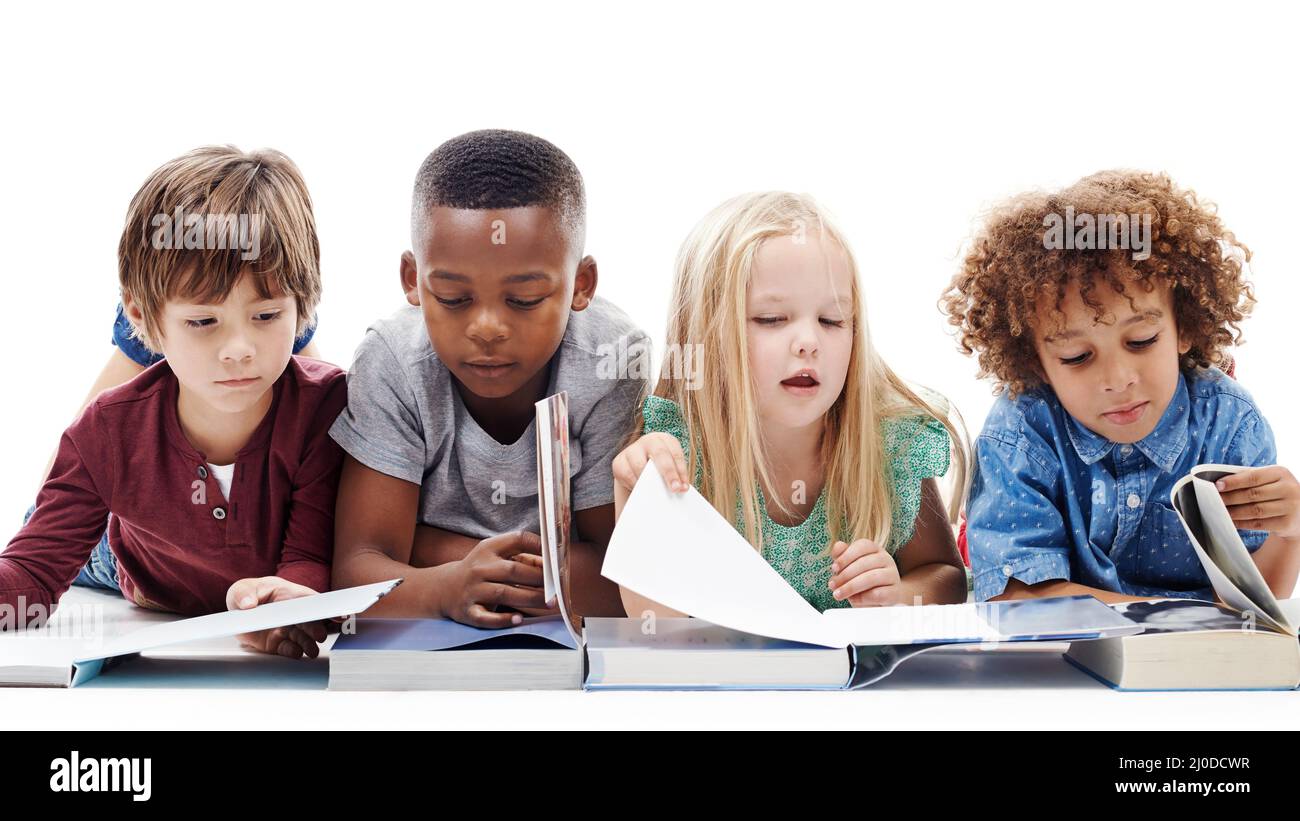 Sharing Books Children sharing book hi-res stock photography and images - Alamy