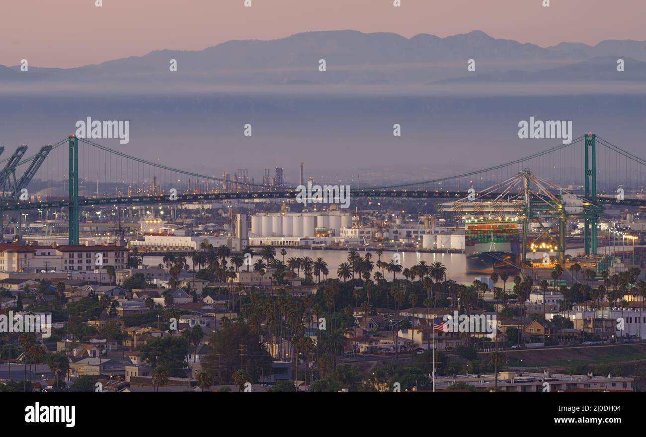 San Pedro, California: the Vincent Thomas Bridge in the Los Angeles Harbor and the San Gabriel Mountains in the background. Stock Photo