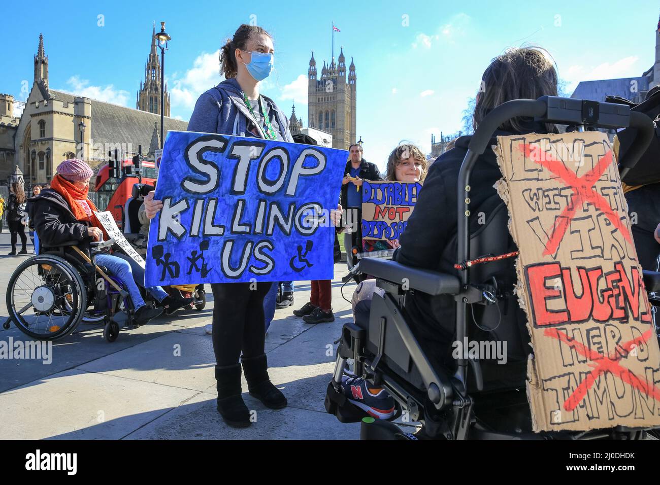 London, UK. 18th Mar, 2022. Protesters on Parliament Square. A rally organised by the Disabled People's Direct Action Networks see people protesting against what they perceive as a failure by government to protect disabled people adequately during the ongoing covid pandemic. Credit: Imageplotter/Alamy Live News Stock Photo