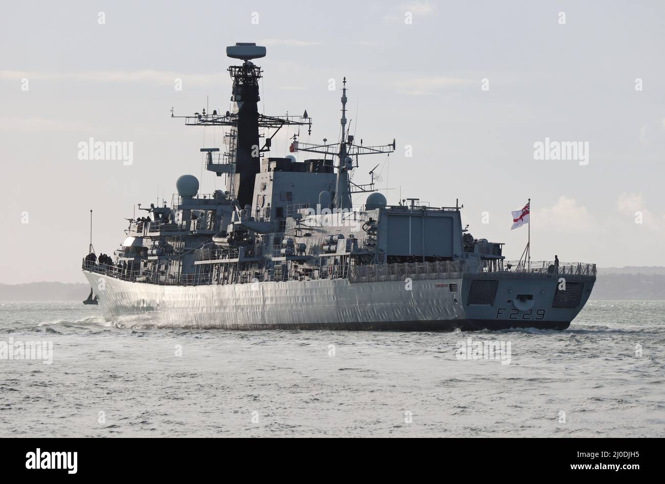 The Royal Navy Type 23 anti-submarine frigate HMS LANCASTER heads into The Solent Stock Photo