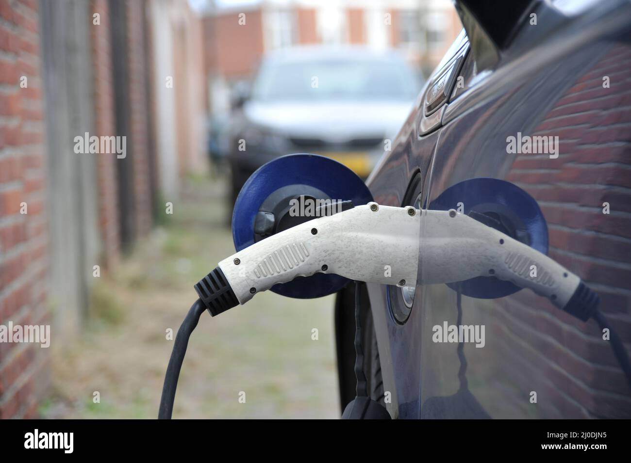 Close up of car EV charging Stock Photo - Alamy