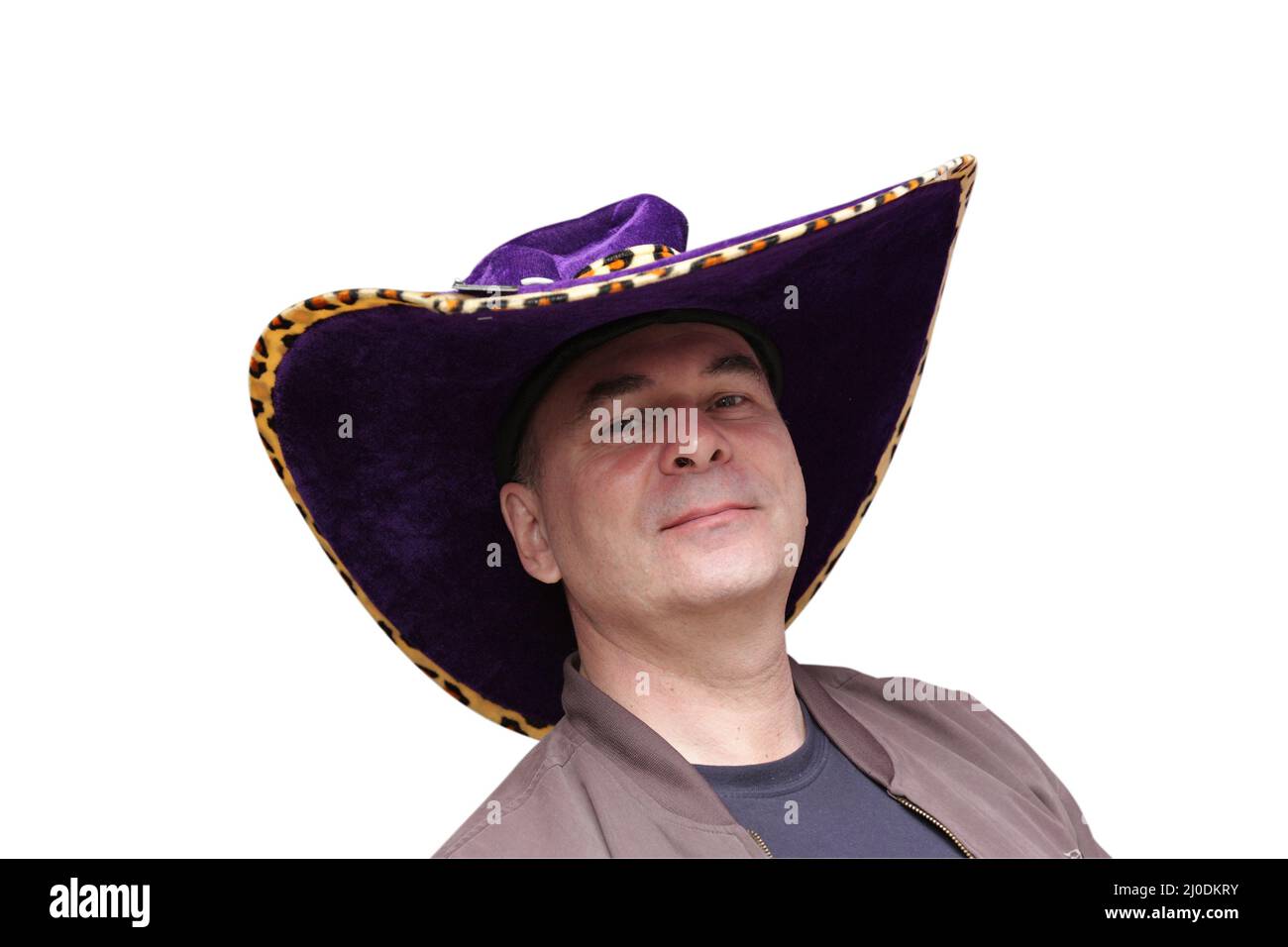 The man poses in a cowboy hat on white background Stock Photo - Alamy