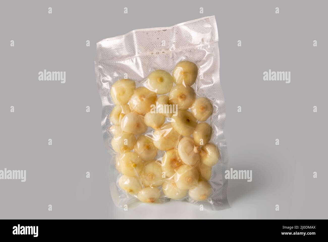 Small flat onions (in Italy called borettane onions) in vacuum packed