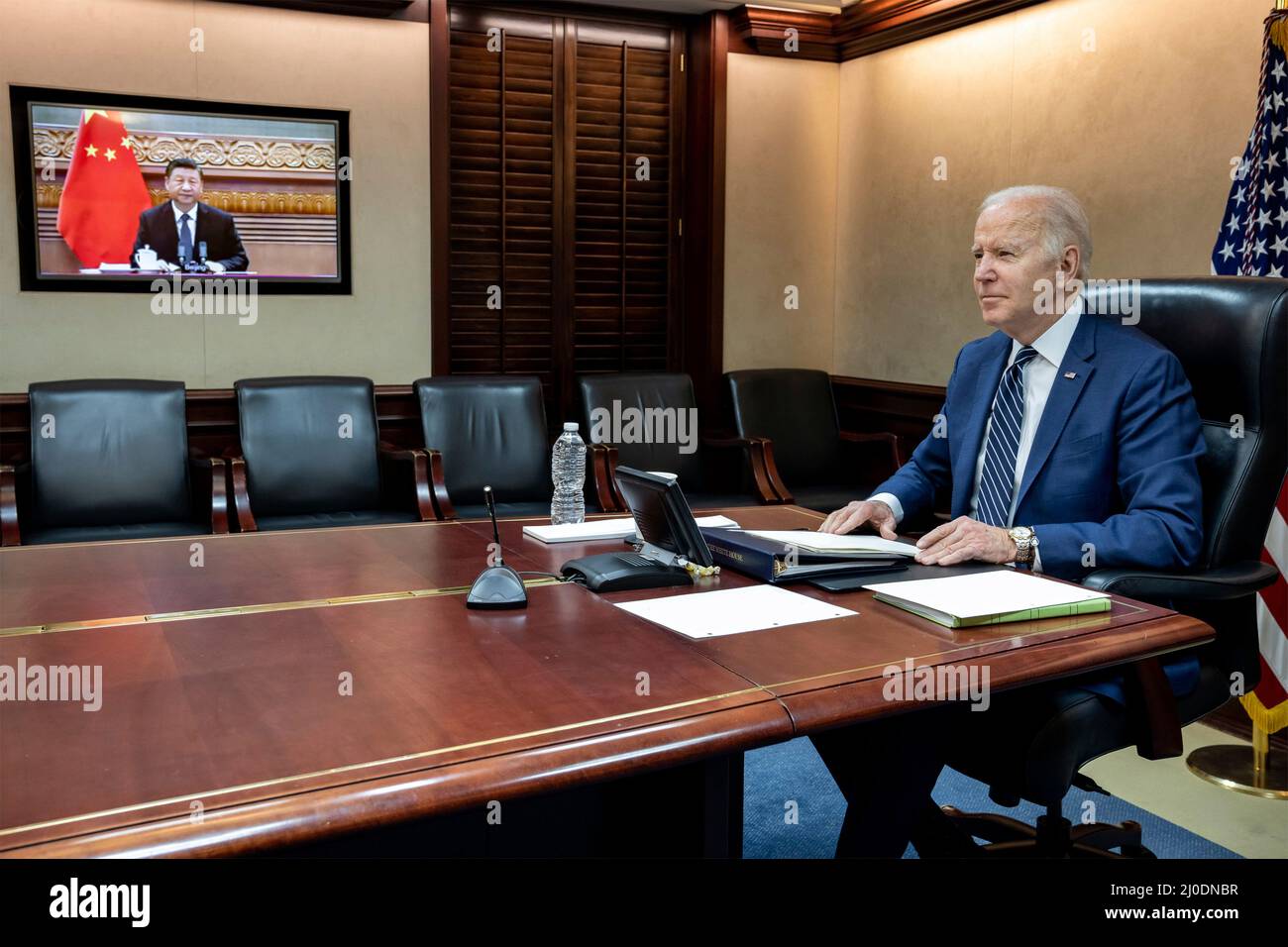 Washington, United States Of America. 18th Mar, 2022. Washington, United States of America. 18 March, 2022. U.S President Joe Biden holds a secure video call with Chinese Premier Xi Jinping to discuss the ongoing crisis in Ukraine, from the Situation Room of the White House, March 18, 2022 in Washington, DC In the two hour call, Biden warned Chinese leader Xi there would be consequences if Beijing gave material support to the Russian invasion of Ukraine. Credit: Adam Schultz/White House Photo/Alamy Live News Stock Photo