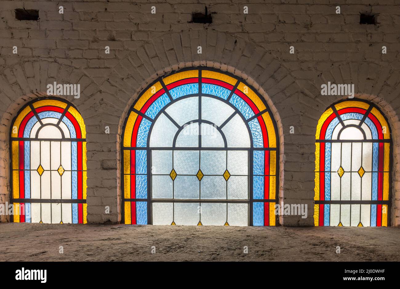 Stained glass windows at the catholic church Stock Photo