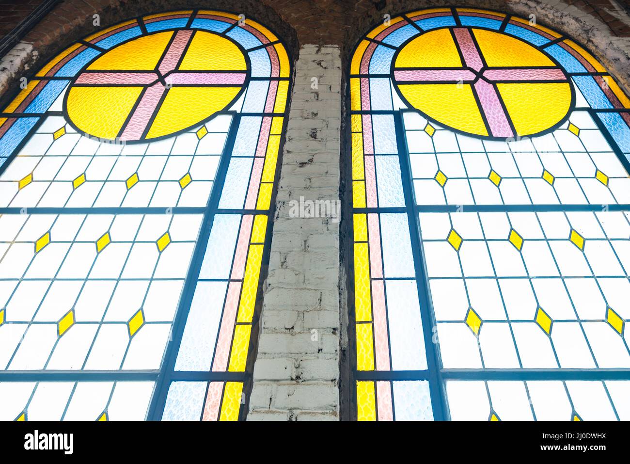 Stained glass windows at the catholic church Stock Photo