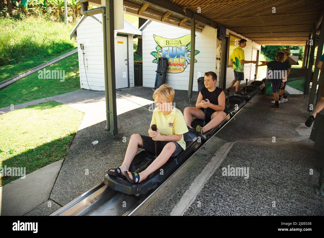 Coffs Harbour, NSW Australia 17 March 2022 Kids riding the toboggan