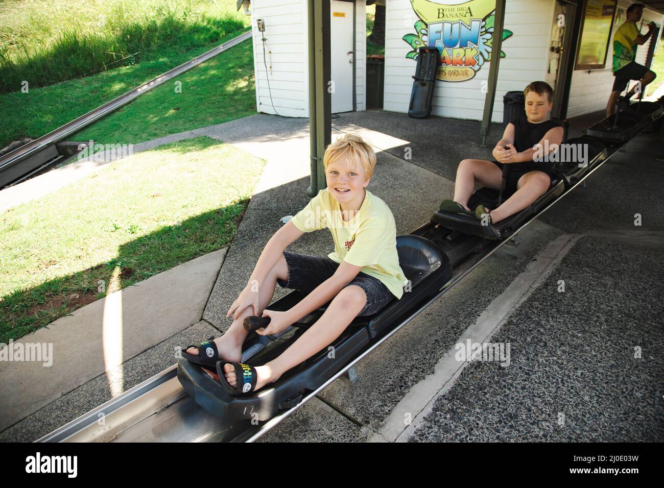 Coffs Harbour, NSW Australia 17 March 2022 Kids riding the toboggan