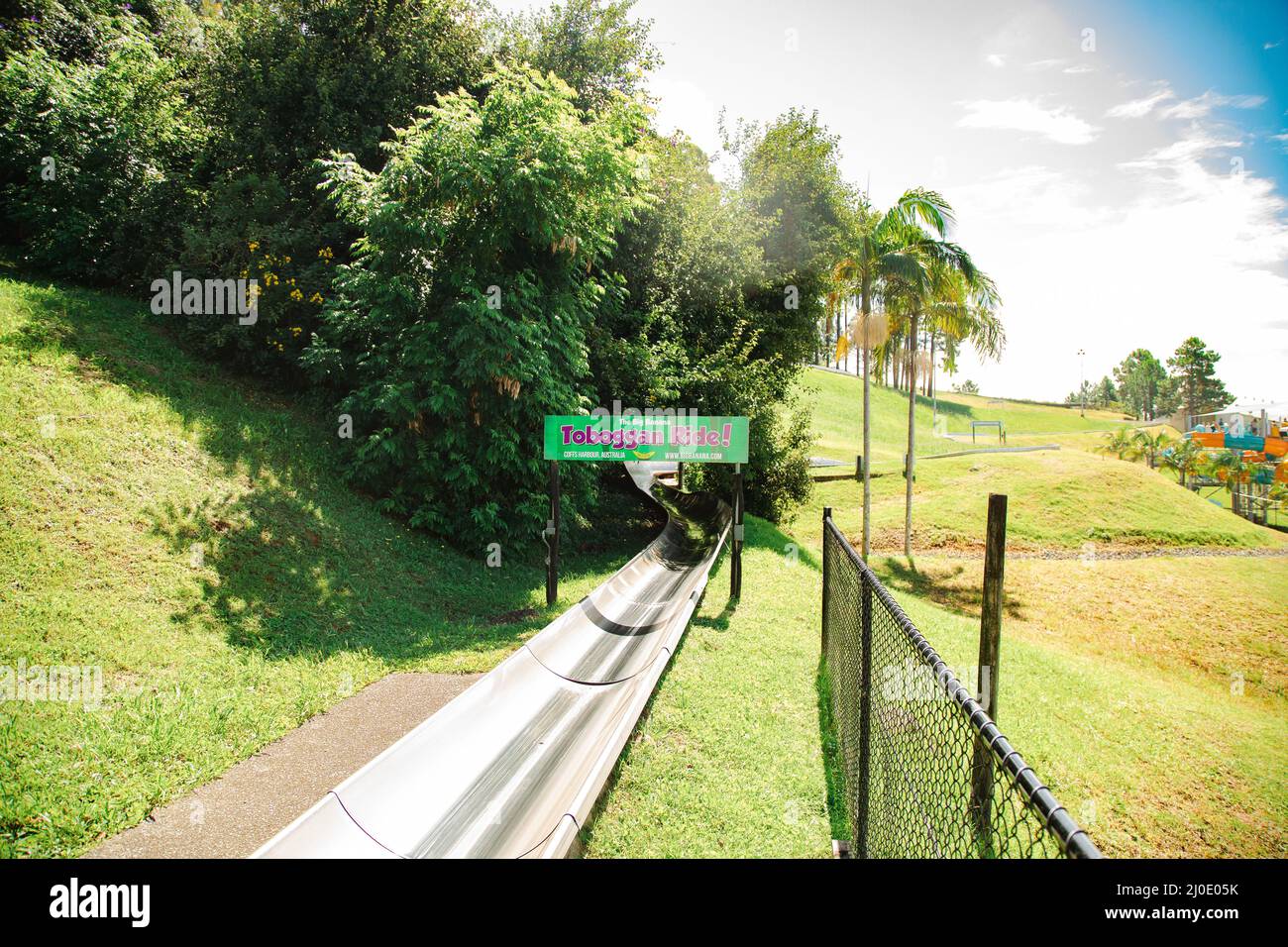 Coffs Harbour, NSW Australia 17 March 2022 Kids riding the toboggan