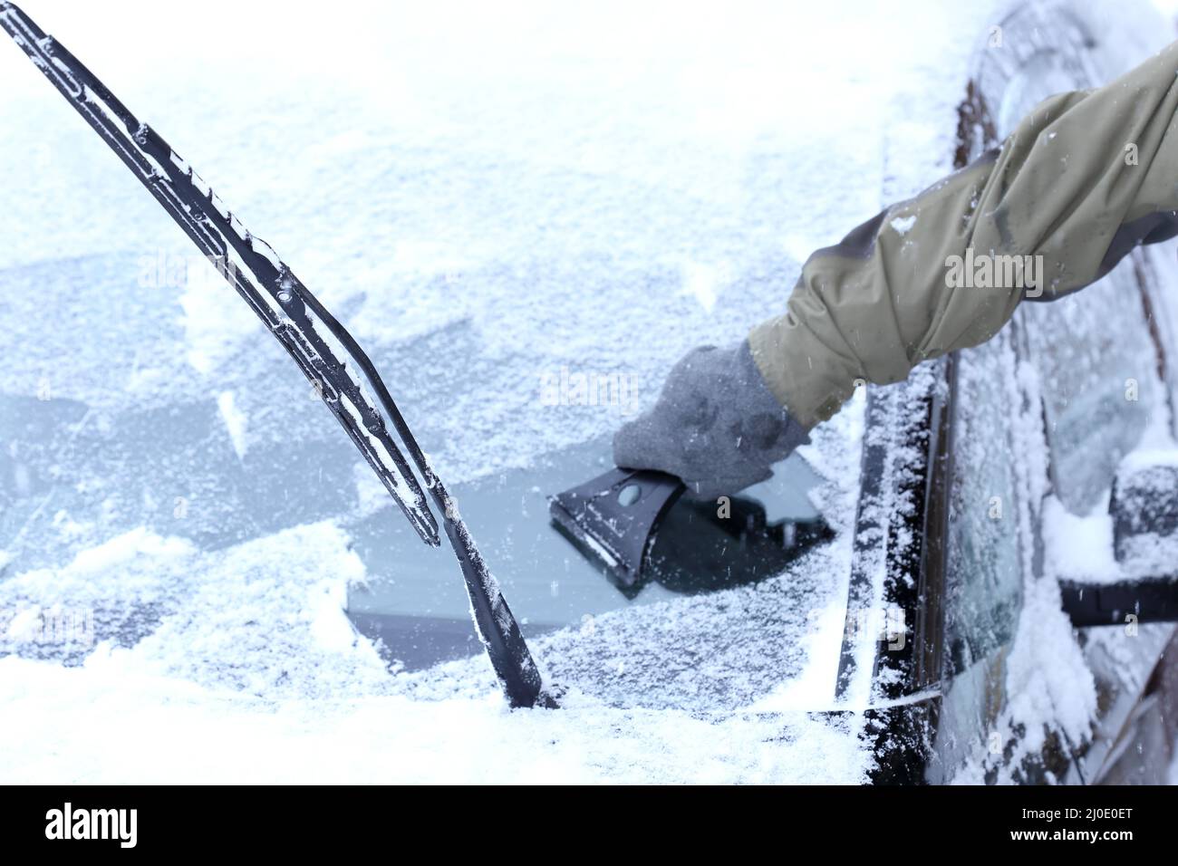 Cleaning a windshield on a car Stock Photo Alamy