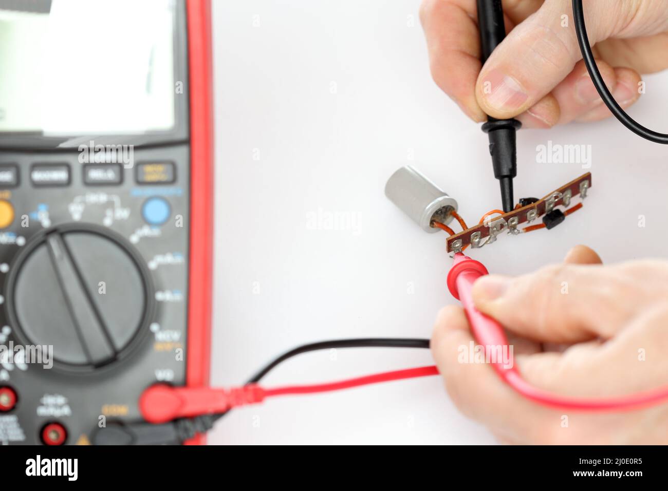 Measuring an electrical capaciter Stock Photo