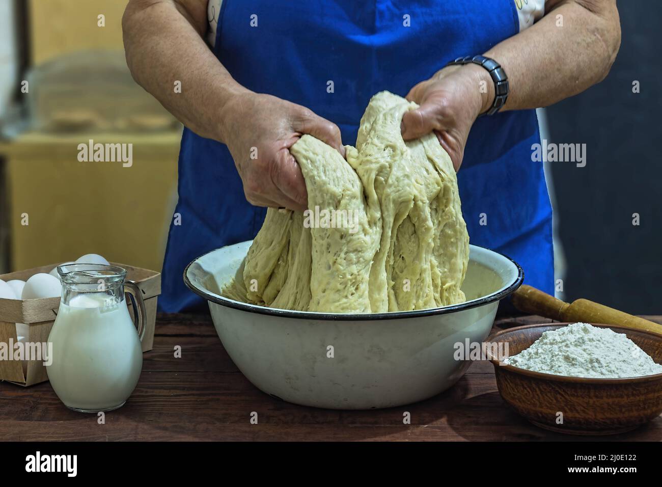 Preparation, bakery,flour, dough, elderly woman, close up, copy space Stock Photo