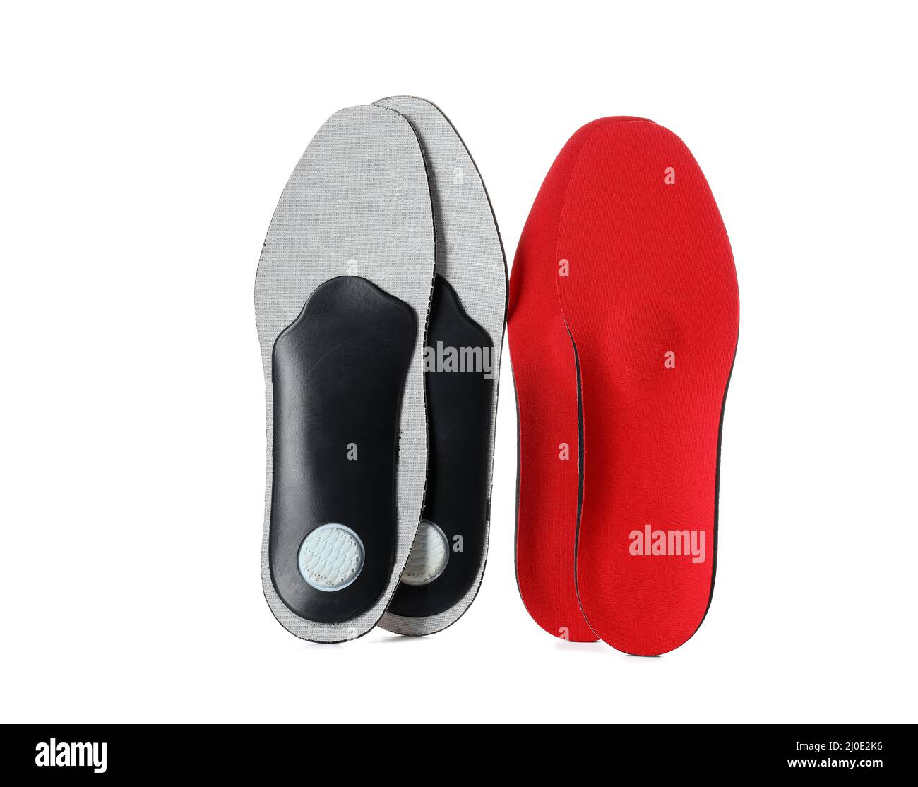 Different orthopedic insoles on white background Stock Photo Alamy