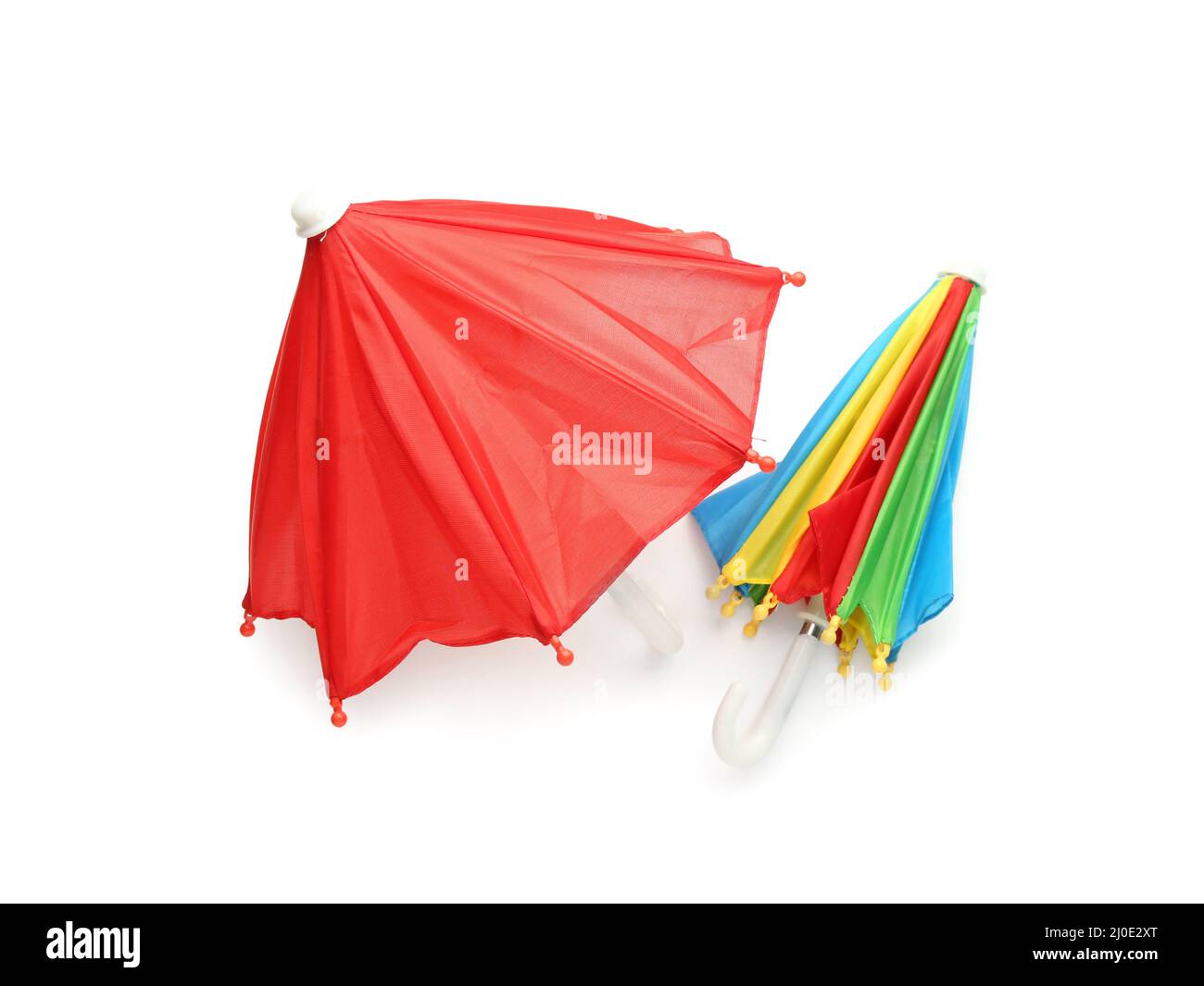 Two colorful umbrellas on white background Stock Photo
