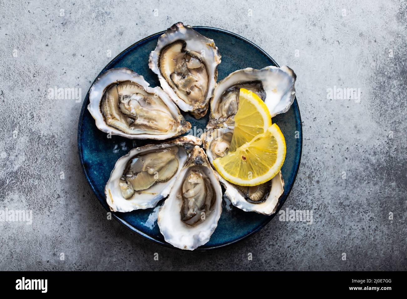 Fresh opened oysters Stock Photo