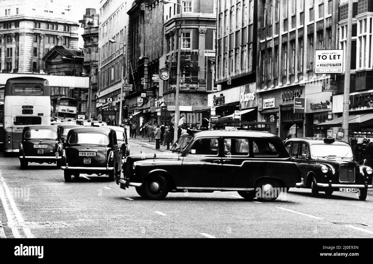 Taxi demo in the rush hour in Church Street. Taxi drivers used bus-only lanes in Lord Street going up and down the street. Drivers say they were promised a year ago by the council that they would be allowed to use bus only lanes in the city centre. 3rd July 1978. Stock Photo