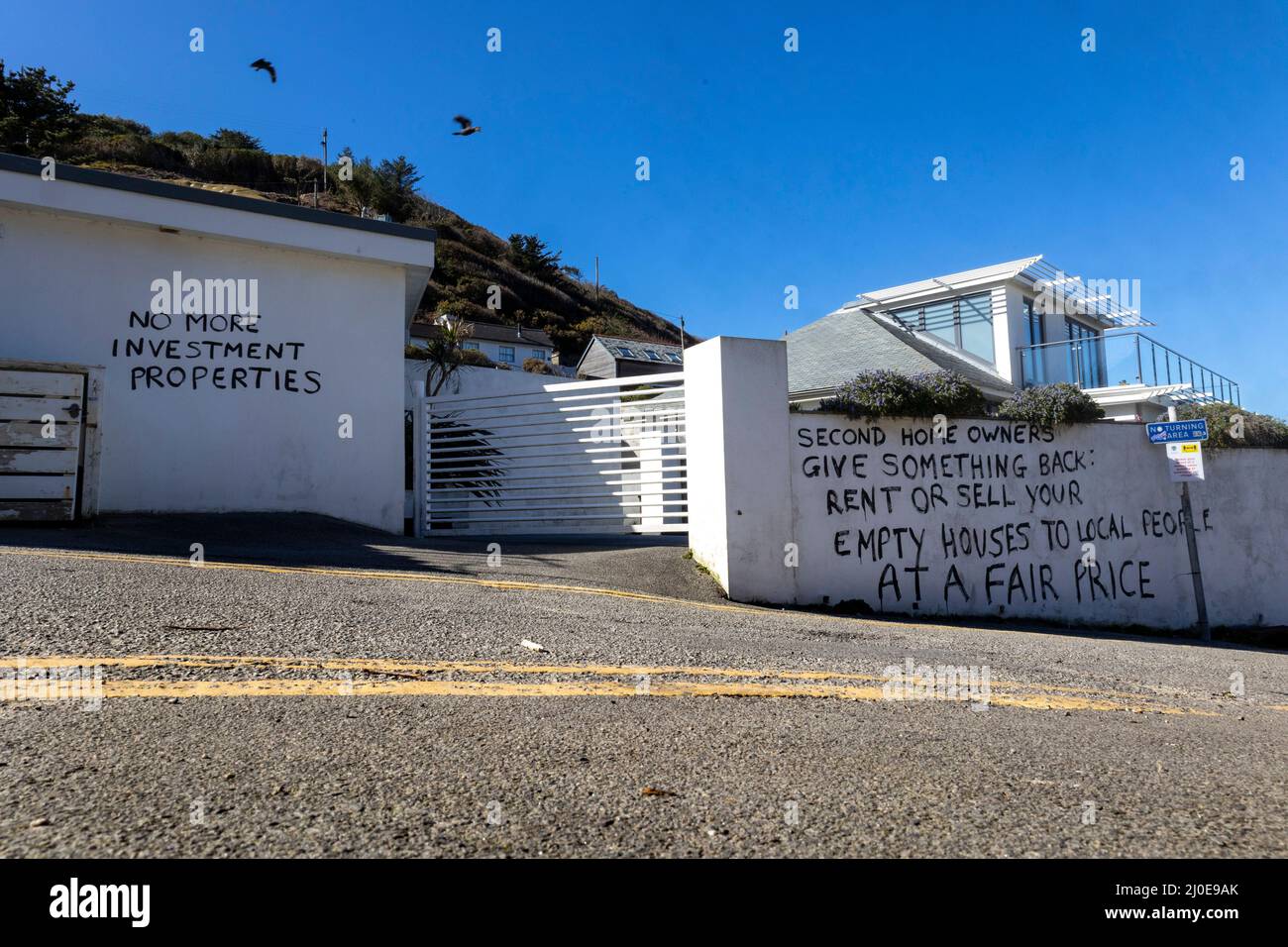 Cornish Resistance to second-home ownership, St Agnes. Suspected Second home plastered with anti-second home message during the Cornish housing crisis Stock Photo