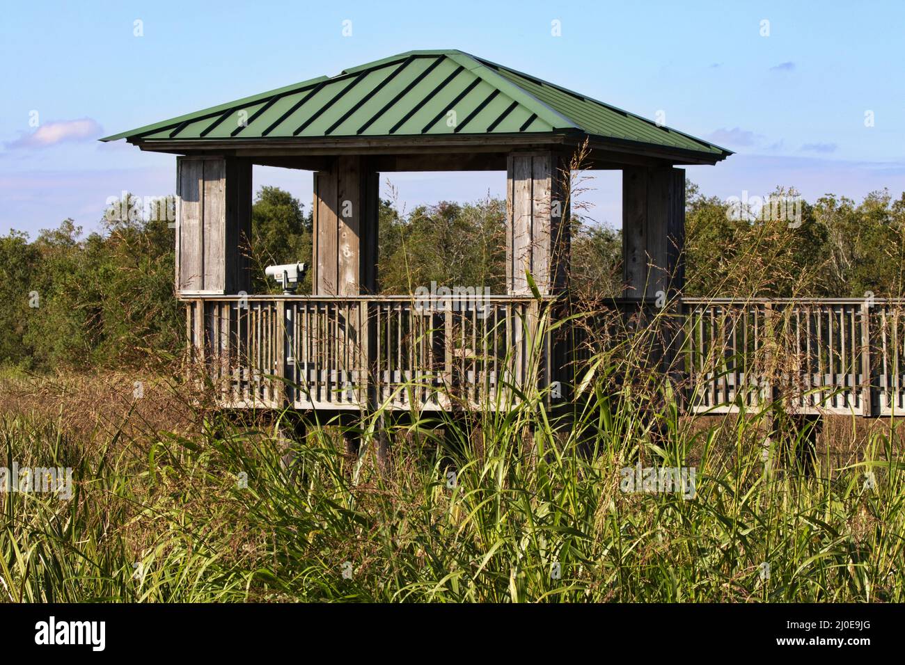 Scenic Louisiana birding and wildlife watching from viewing deck equipped with scope at Cameron Prairie National Wildlife Refuge Stock Photo