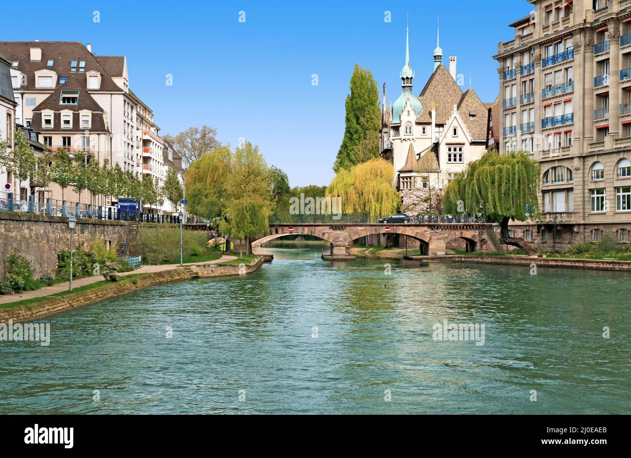 The Saint Etienne bridge over the Ill and the pontonniers high school in Strasboug. France.. Stock Photo