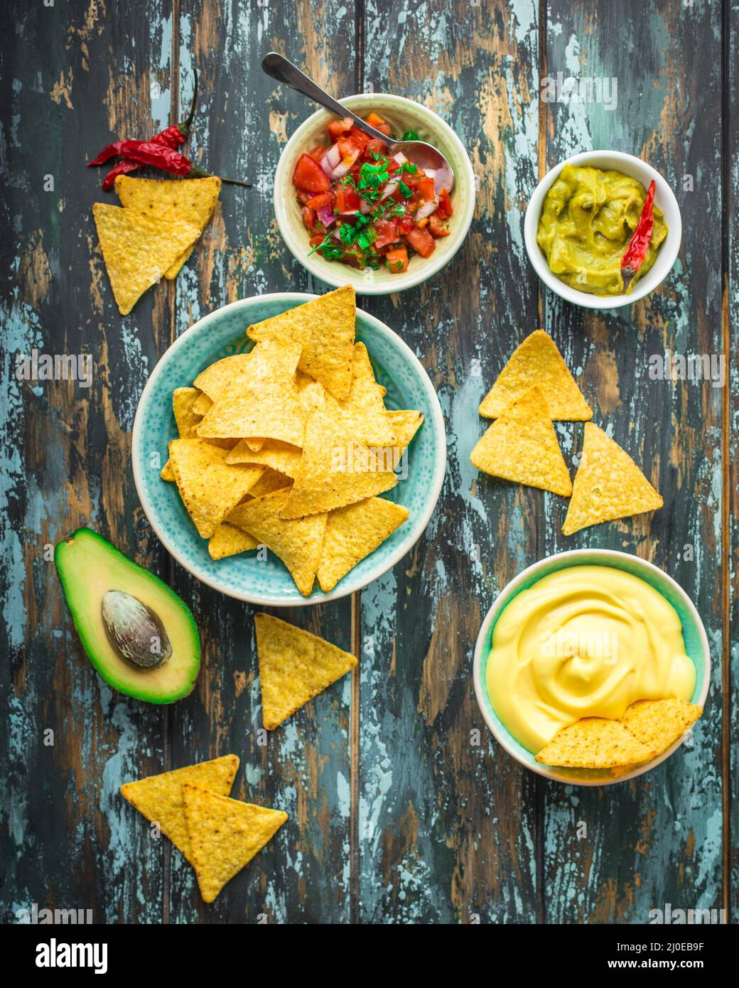 Nachos and assorted dips Stock Photo