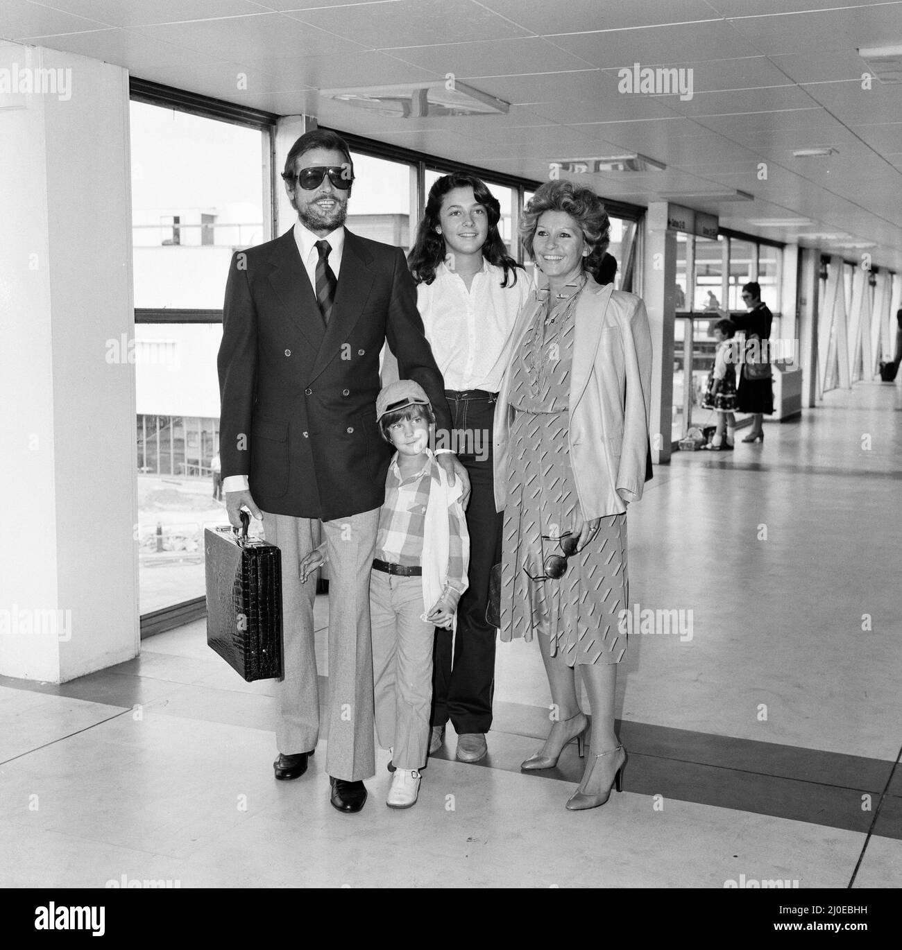 Roger Moore at LAP with his wife Luisa and two of their children, Christian and Deborah. 27th June 1979. Stock Photo